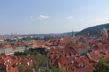 Fototapeta na wymiar view from Prague Castle with red roof in summer, a castle in Prague, Czech Republic, built in the 9th century. The official office of the President of the Czech Republic