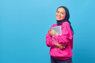 Photo of women Asia hold laptop wear pink sweater