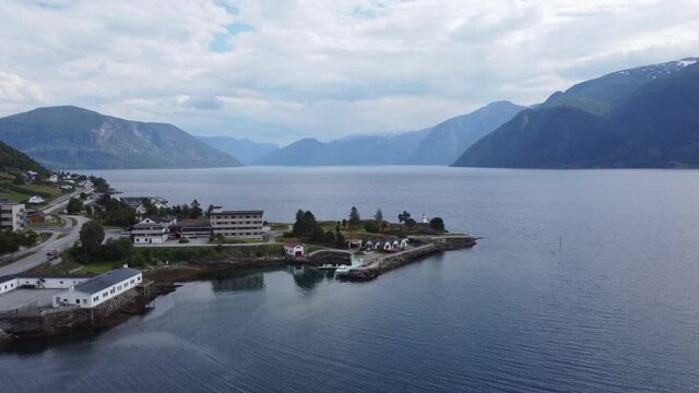 Lighthouse out on headland in Leikanger Sognefjord Norway - Aerial