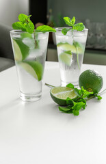 gin tonic mojito glass cocktail water ice lime mint table drink