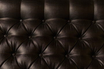 leather upholstery brown background sofa light shadow