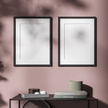 Two vertical blank canvases in a black frame on the background of the wall in the living room. Mock up. 3d rendering