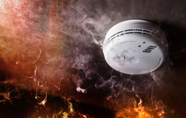 Smoke detector and fire alarm in action background - obrazy, fototapety, plakaty