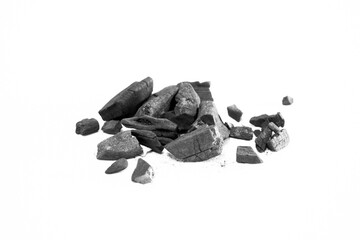 Small pile of black charcoal firewood