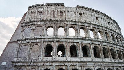 Fototapeta premium Wonderful Roman architectural features in Colosseum facade, ancient and biggest Roman amphitheater in the world