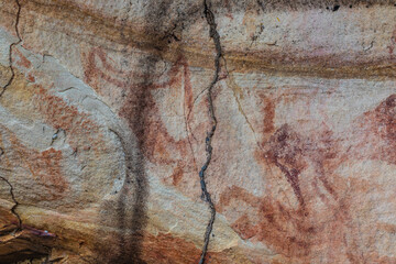 Prehistoric paintings in the cave at Singha Cave Udon- Thani province, Thailand.