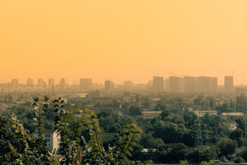 Yellow fog over the city. Yellow smog over houses in the city. Air pollution