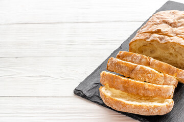 Close up of whole grain bread on cuttin board