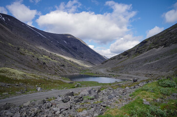 Lake on the pass Kukisvumchorr. Hibiny mountains above the Arctic circle, Kola peninsula, Russia