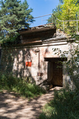 Fototapeta premium The abandoned command post of a 130-mm battery at the military-historical site of Fort Krasnaya Gorka (Krasnaya Gorka)