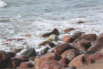smooth wet stones on the beach