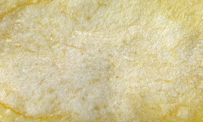 Background, potato chip surface. Potato chips.