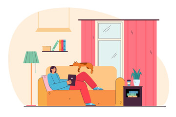 Obraz na płótnie Canvas Girl lying on sofa and holding tablet flat vector illustration. Young lady relaxing in cozy apartment. Womans cat sleeping on coach. Hygge, comfort, house concept