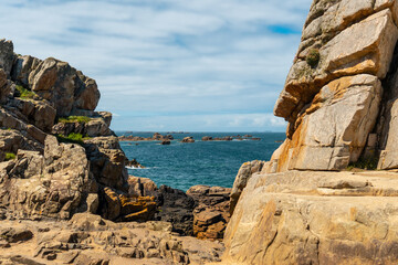 The beautiful coastline at low tide of Le Gouffre de Plougrescant, Cote de Granit Rose, Cotes d'Armor, Brittany, France