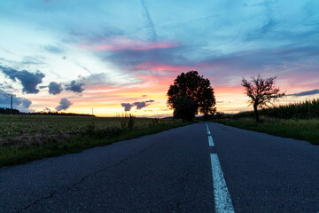 sunset over the road