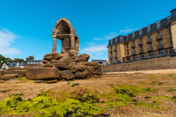 Low tide at the sanctuary of La Plage Saint Guirec, in the town of Perros-Guirec in the Cotes-d'Armor department, in French Brittany, France.