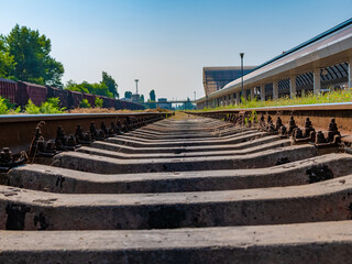 Fototapeta na wymiar Close-up. Empty railroad tracks stretching into the distance.