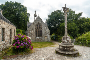Sculpture next to the church of the medieval village of Locronan, Finistere, Brittany Region, France