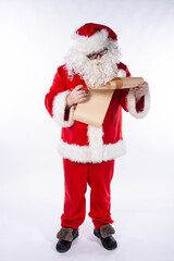 Funny Santa Claus with a list of gifts.