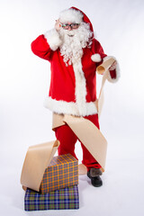 Funny Santa Claus with a list of gifts.