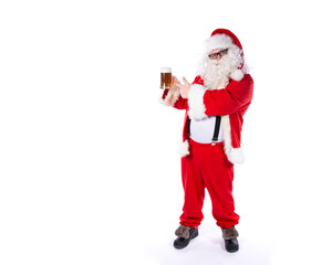 Funny Santa Claus drinks beer.