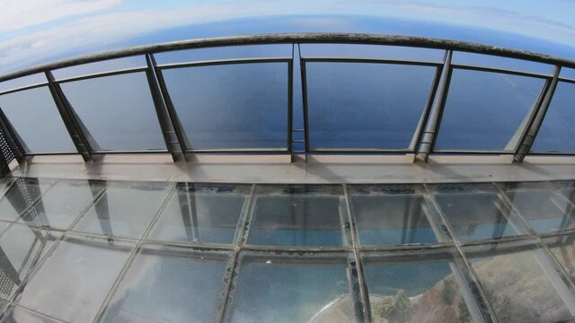 POV shot of a man at Cabo Girao cliff, Madeira, Portugal
