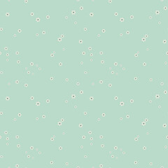 Little flowers chaos seamless pattern. Polka dot background in mint and beige shades. Small blossom snowflakes