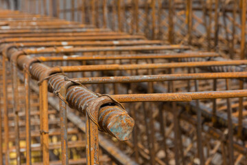 Rebar texture. Reinforcement steel rod. Rusty rebar for concrete pouring. Steel reinforcement bars. Construction rebar steel work reinforcement. Closeup of Steel rebars.