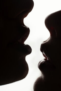 Kiss. I Love You. Couple In Love. Intimate relationship and sexual relations. Closeup mouths kissing. Passion and sensual touch. Romantic and love.