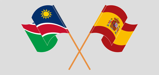 Crossed and waving flags of Namibia and Spain