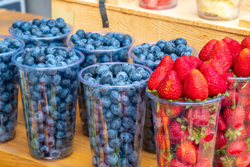 Strawberry and blueberry berries on a outdoor market