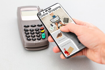 Smart phone online shopping in woman hand. Network connection on mobile screen. Payments online