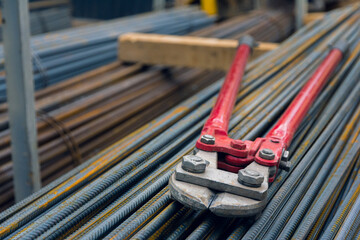 Large Pliers or clipper for cutting wire or steel bars. Hand manual steel wire rope cutter. Construction tool at a construction site