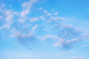 Beautiful white clouds in blue sky. Cirrocumulus clouds formation