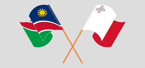 Crossed and waving flags of Namibia and Malta