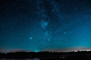 Starry night sky in the village