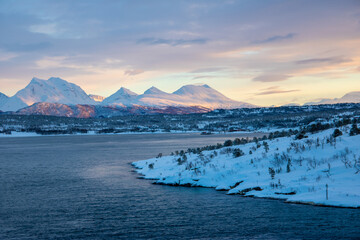 Fototapeta na wymiar Colourful mountains with snow in Tromsø, Norway