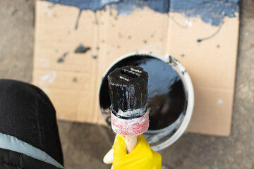 Paint for the street. Painting the object. Marking the road.