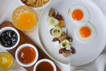 Breakfast in luxutry hotel with orange juice and various delicious choices of food.