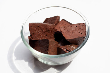 Chicken blood tofu in glass bowl on white background.