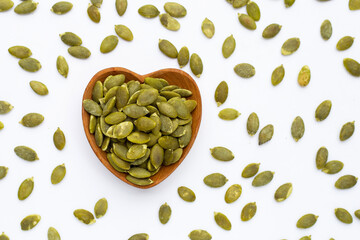 Pumpkin seeds on white background