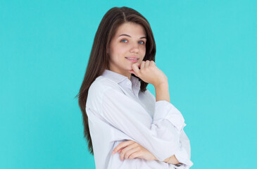Closeup photo of amazing lady arm on chin wear white shirt isolated blue color background