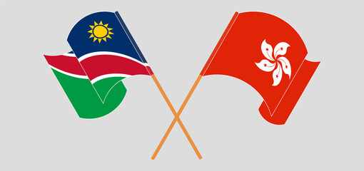 Crossed and waving flags of Namibia and Hong Kong