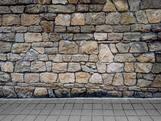 background texture wall of natural stone and pavement with cobblestones