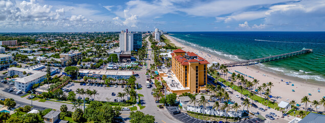 panoramic aerial drone shot of Deerfield Beach, Florida with city and beach