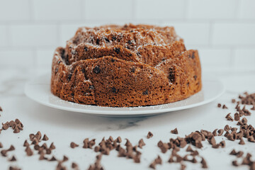 An ornate and decorative homemade and fresh chocolate chip bundt cake