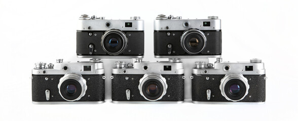 The old 35 mm film rangefinder cameras on white background.