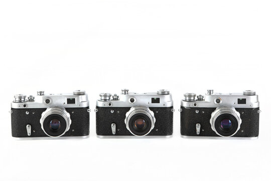 The old 35 mm film rangefinder cameras on white background.