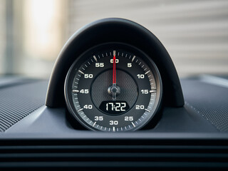 Interior details of a sports car. Sports chronometer with electronic clock or analog clock to choose from.