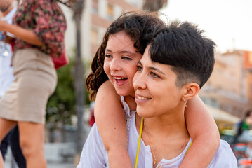 Mother and daughter enjoying summer outside